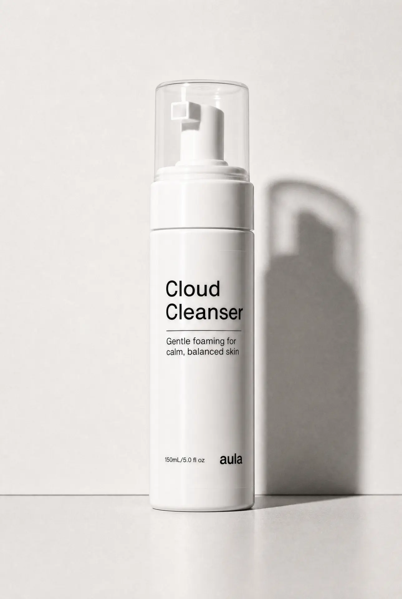 Cloud Cleanser bottle in soft studio light